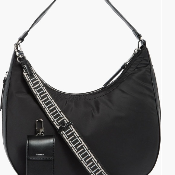 Tahari
Minetta Expandable
Crescent Bag NWT - Picture 3 of 6